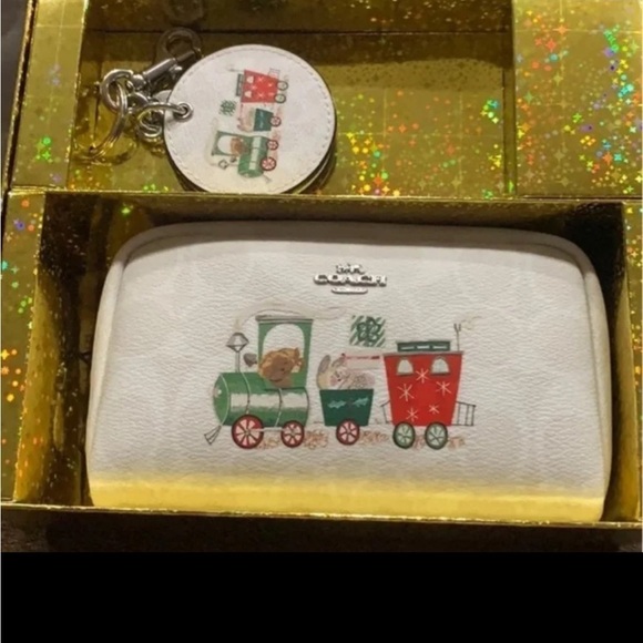 Small Boxy Cosmetic Case And Mirror Bag Charm In Signature Canvas With Train - Picture 4 of 5